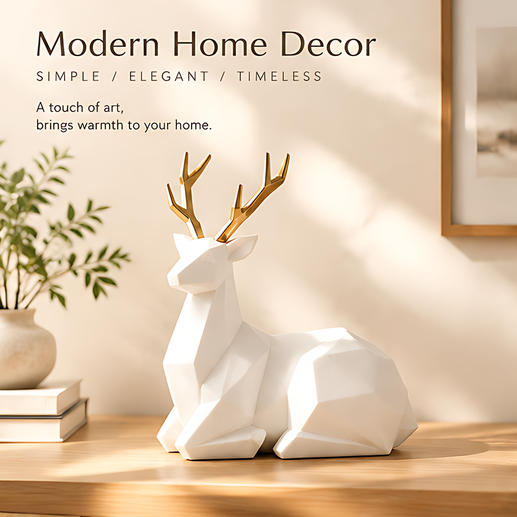 White and gold-tone deer sculpture styled beside books and greenery in a modern home