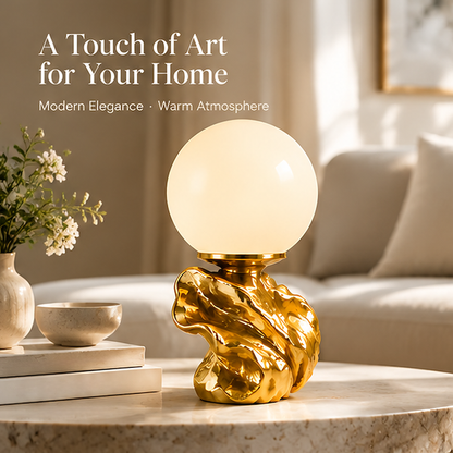 Sculptural globe lamp beside books and flowers with text describing modern elegance and warm atmosphere