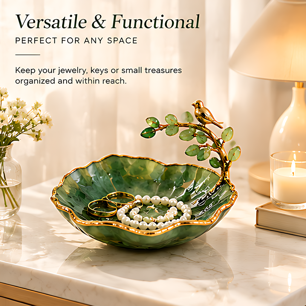 Empty green leaf-shaped dish with bird branch and text highlighting nature-inspired design, home styling and gifting